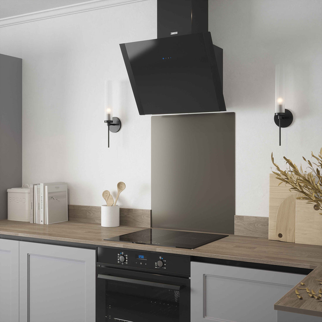 Matt gun metal splashback positioned in grey, modern kitchen